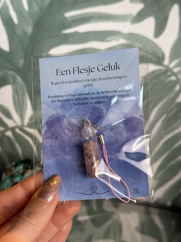 Een flesje geluk (rozenkwarts of amethist)